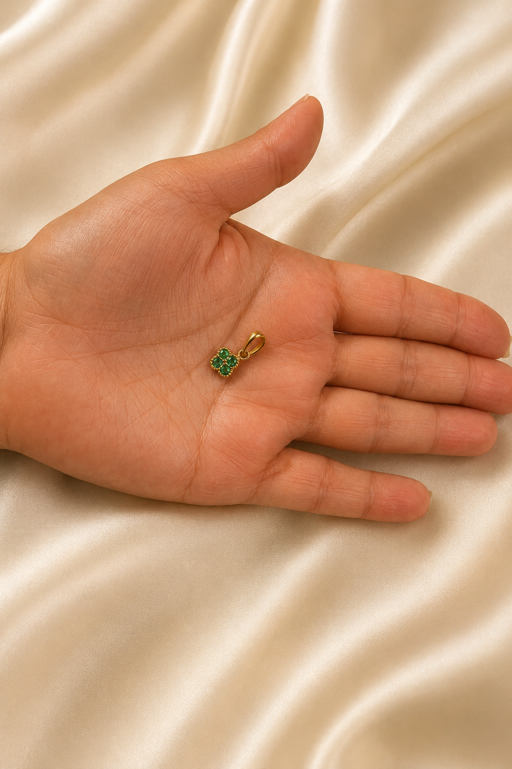 Emerald & 18K Gold Flower Pendant — 0.13 ct
